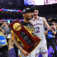 Apr 4, 2022; New Orleans, LA, USA; Kansas Jayhawks guard Dajuan Harris Jr. (left) and guard Christian Braun (2) celebrates their win against the North Carolina Tar Heels in the 2022 NCAA men's basketball tournament Final Four championship game at Caesars Superdome. Bob Donnan-USA TODAY Sports